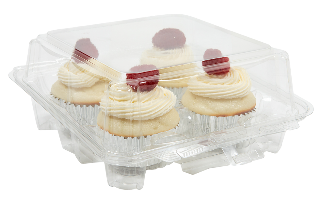 Cupcake container with four raspberry cupcakes